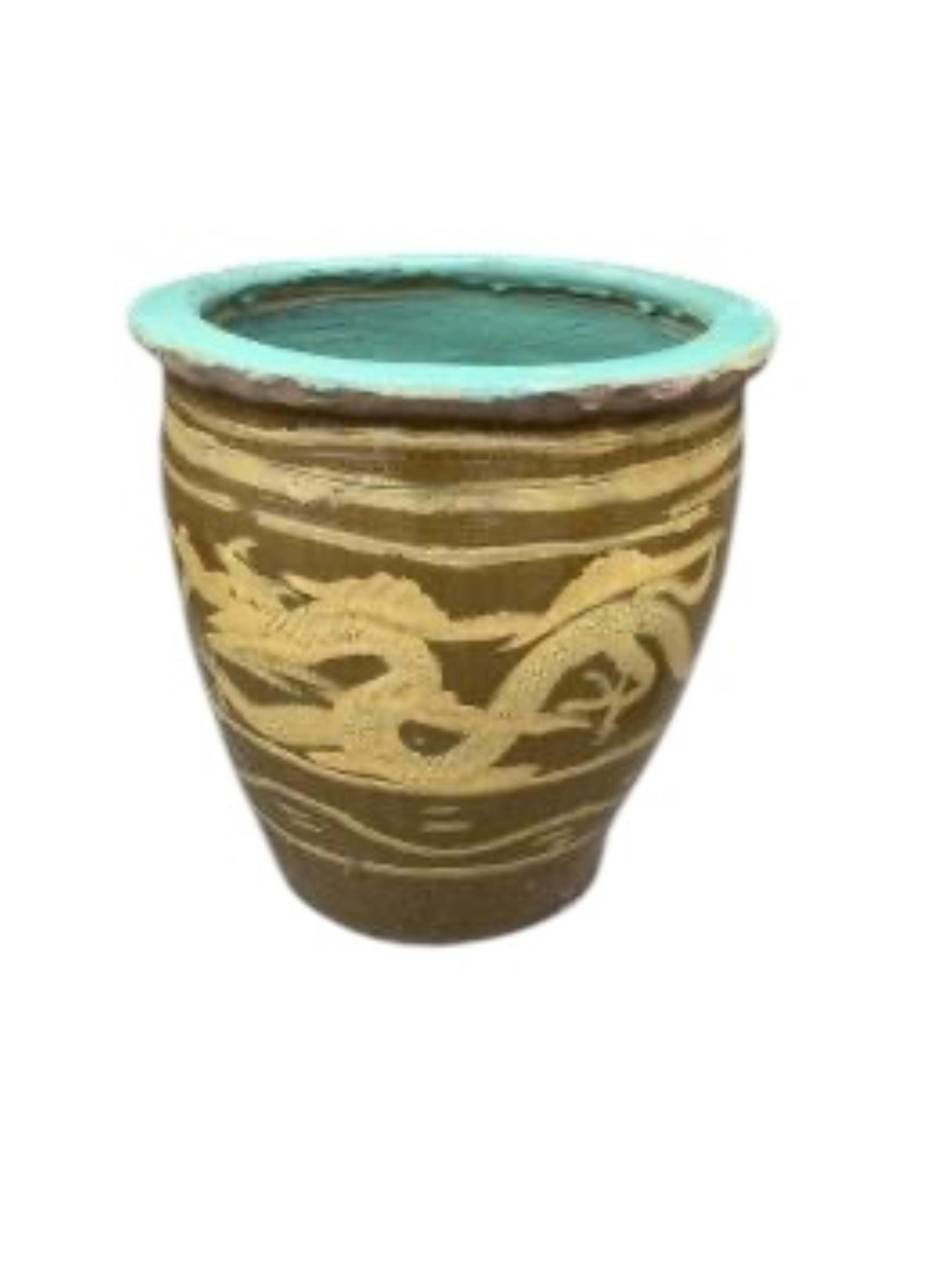 A pair of Chinese style circular earthenware garden planters, diameter 36cm, height 39cm